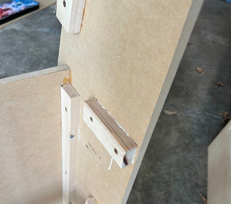 Close-up of the internal joint showing the 1x2 cleats secured with screws